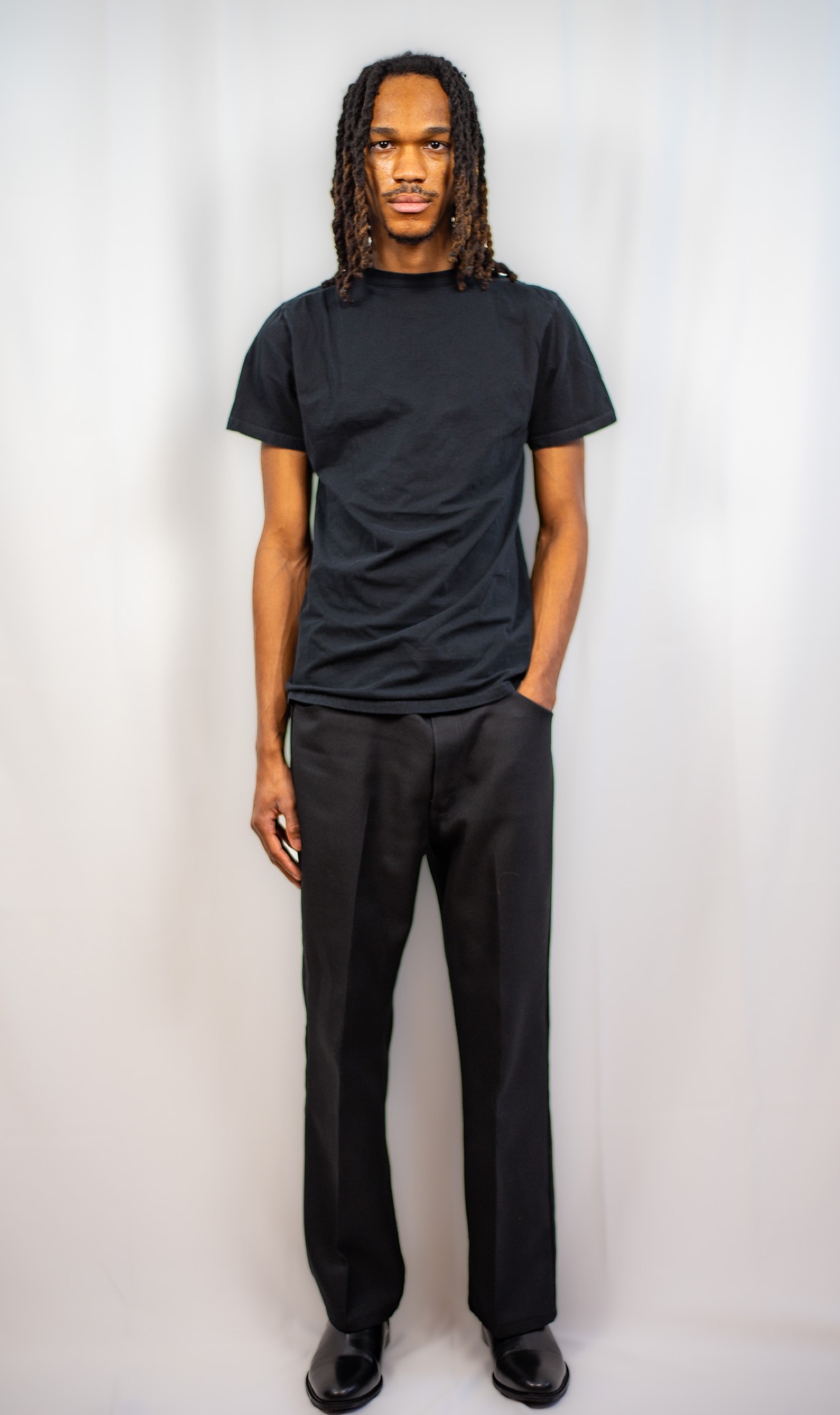 Full body digital of Kamari in black wardrobe